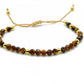 bracelet réglable perles à facettes 4mm œil de tigre jaune et perles dorées 3mm sur cordon doré selection zen