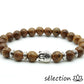 bracelet bouddha argenté bois 8mm 19cm selection-zen