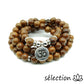 selection zen mala 8mm bois avec médaillon om
